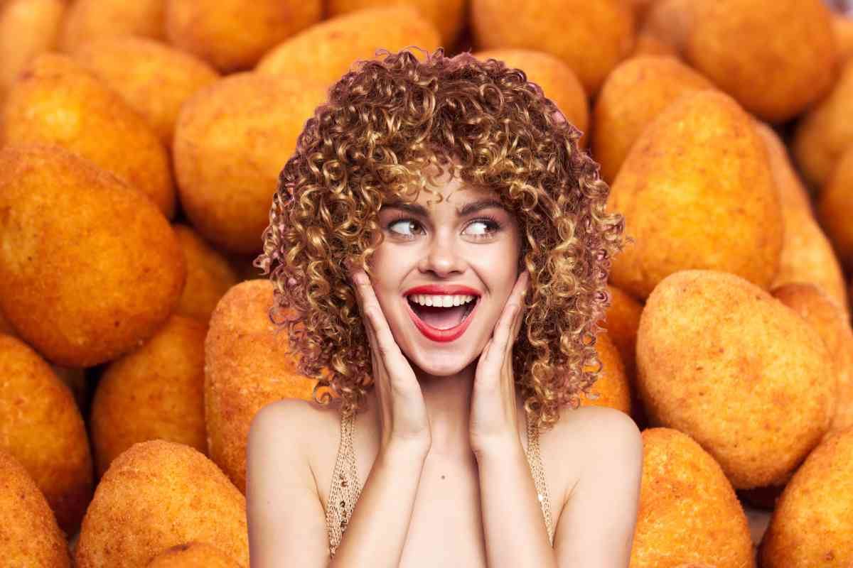 Donna stupita e arancini
