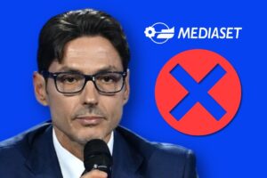 Pier Silvio Berlusconi, logo Mediaset e croce