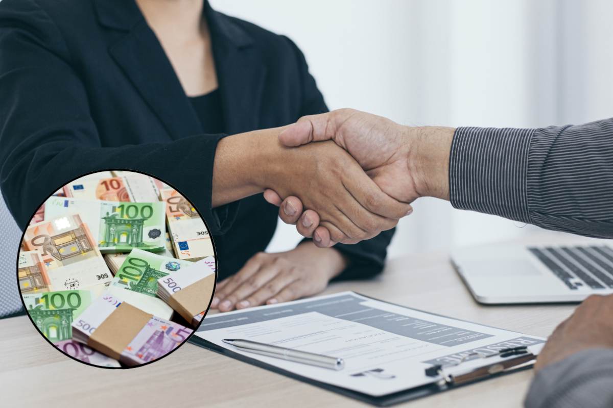 stretta di mano ed euro