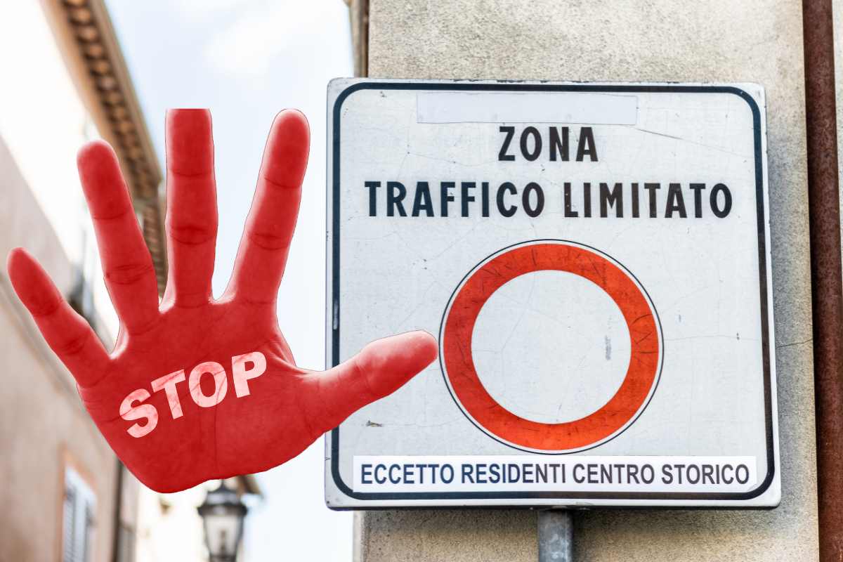 cartello ztl e mano con scritta stop