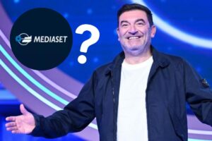 max giusti logo mediaset e punto interrogativo