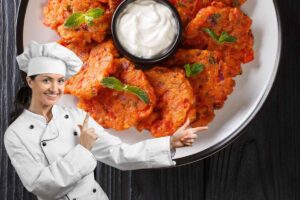 chef e piatto di domatokeftedes